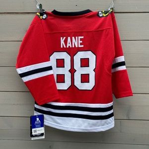 New Kids Black Hawks hockey Patrick Kane jersey - new tags still on, size 5-6